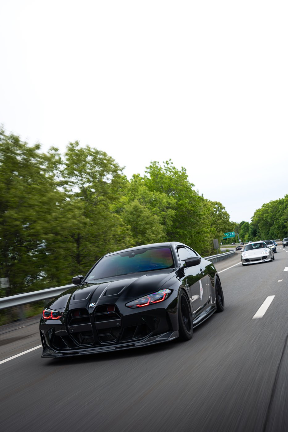 A BMW staying with the convoy on the drive to Brookline